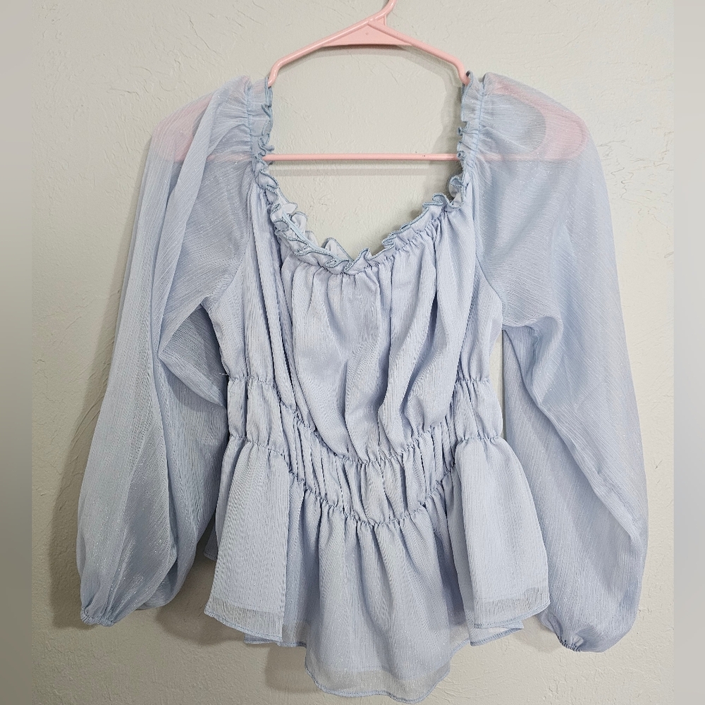Light blue top